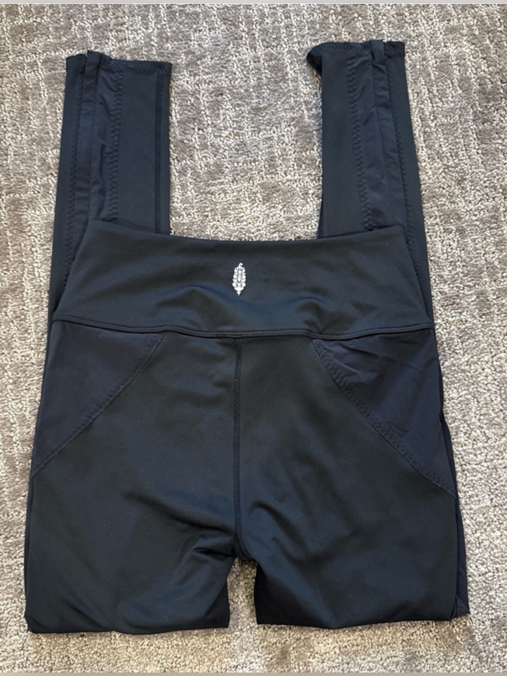 Free People- black leggings with stitching design and zipper pockets Size S